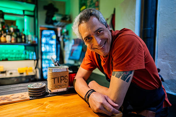 Portrait of a waiter on a bar