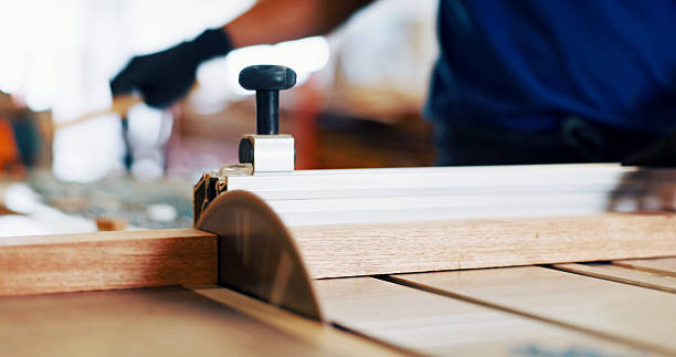istock Woodwork, equipment and person in workshop for project, manufacturing or process in industry. Artisan closeup and carpenter with timber material for craft, small business or furniture production. 2217279523