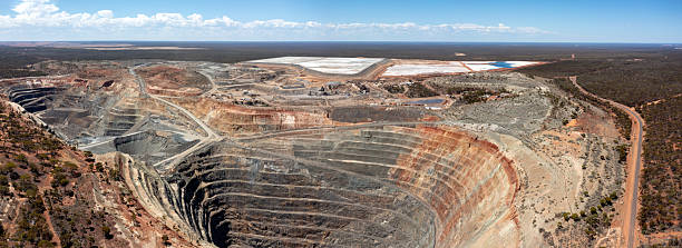 istock Panoramic aerial view of a large active gold mine 2217285447
