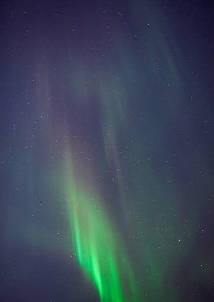 istock Aurora borealis, polar lights with Milky Way stars. 2217289810