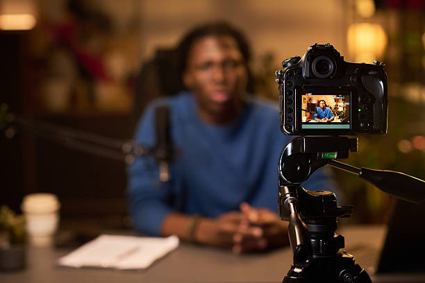 istock Recording Podcast Episode with Focused Host 2217292237