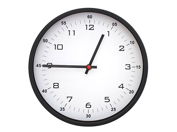 Wall clock with blue frame showing 12.45 00.45 or 12.45 O clock  on white background, suitable for time related articles, education, or punctuality concepts