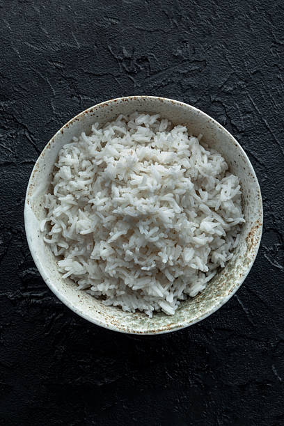istock White rice, cooked. A bowl of boiled long grain rice, a simple side dish 2217293111