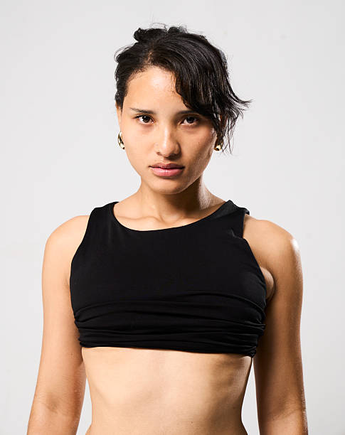 istock Young woman posing llooking directly into camera confident 2217293575