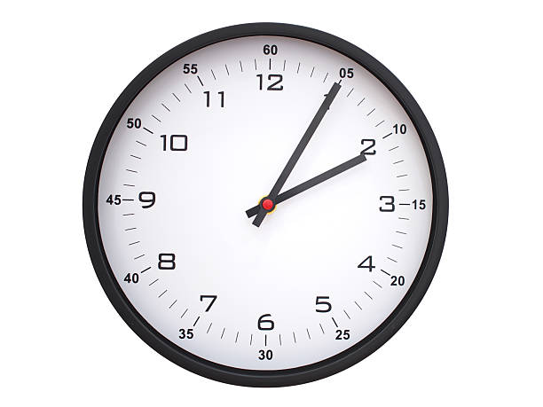 A modern white face with black numbers analog wall clock Showing 02:05 or 14:05. Isolated on White Background.