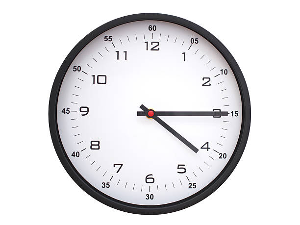A modern white face with black numbers analog wall clock Showing 04:15 or 16:15. Isolated on White Background.