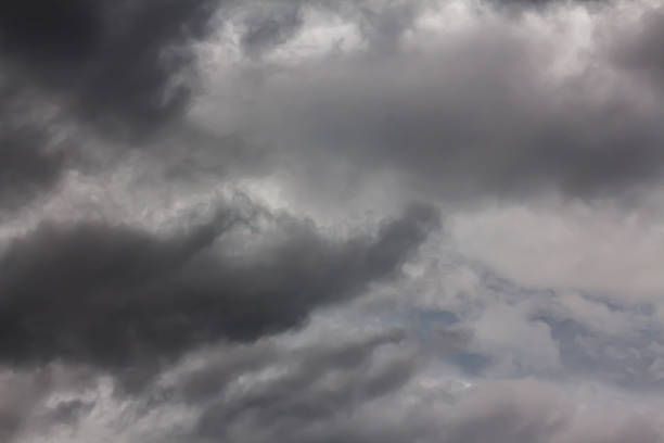 istock Grey rain clouds in the sky above the city 2217301328