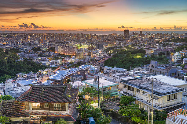 Naha, Okinawa, Japan downtown city skyline at dusk.