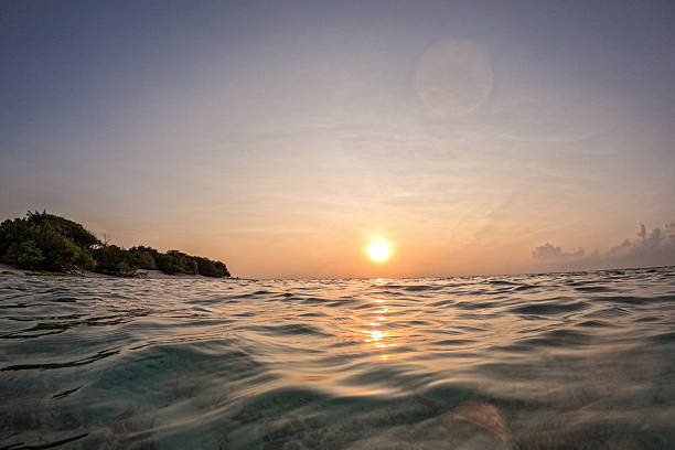 Seawater surface on Fulhadhoo island in Maldives.
