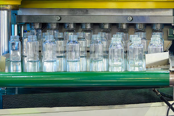 istock The wide mount plastic bottle manufacturing process by injection blow mold machine. 2217315905