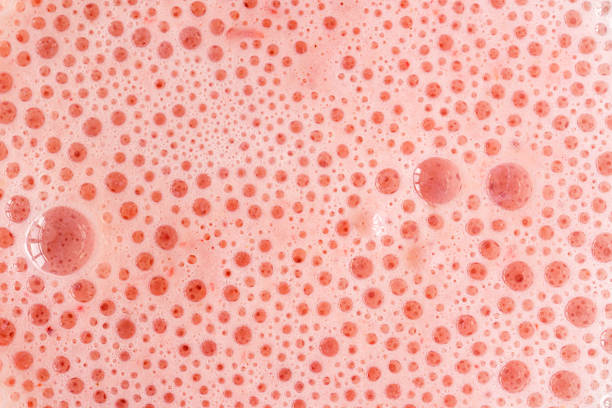 Delicious beverage with whipped cream and sprinkles in a cafe atmosphere.