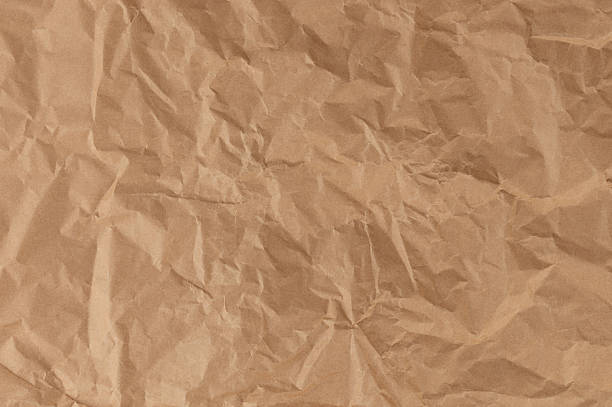 istock Ripped brown paper page 2217330248