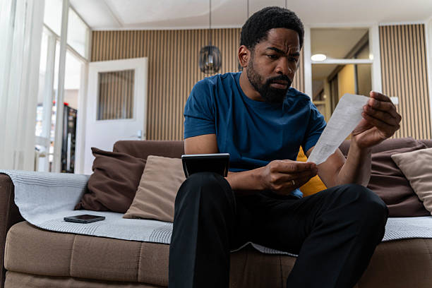 istock Young man handled household expenses 2217331065