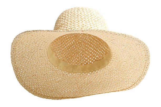 istock Beach straw hat front view and raised up isolated white background. Hat with clipping path as design banner, studio shot with sunlight. Summer travel hat for beach holidays on Vacation 2217331186