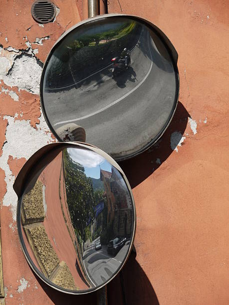 istock Two mirrors are reflecting the road and the motorcycle 2217332411