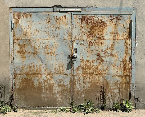 istock The door is rusted and has a lock on it 2217334305