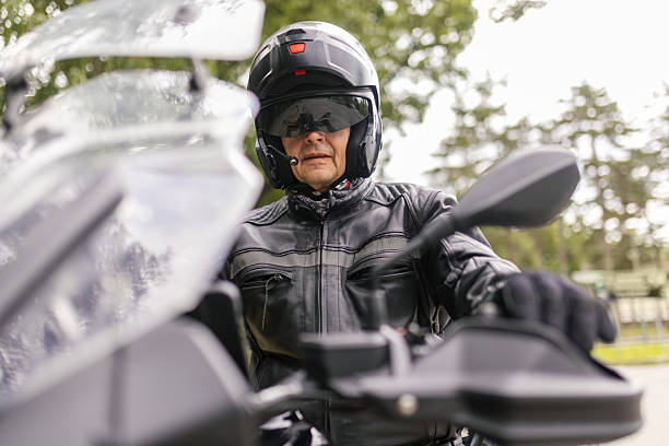 istock A man is sitting on his motorcycle on road 2217335932