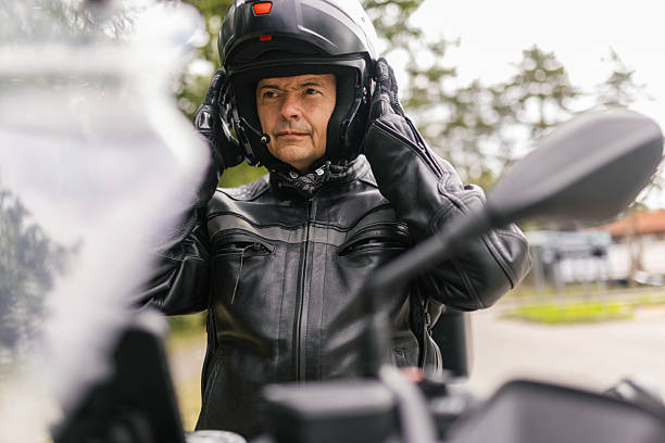 istock A man is setting safety helmet on the head 2217335935