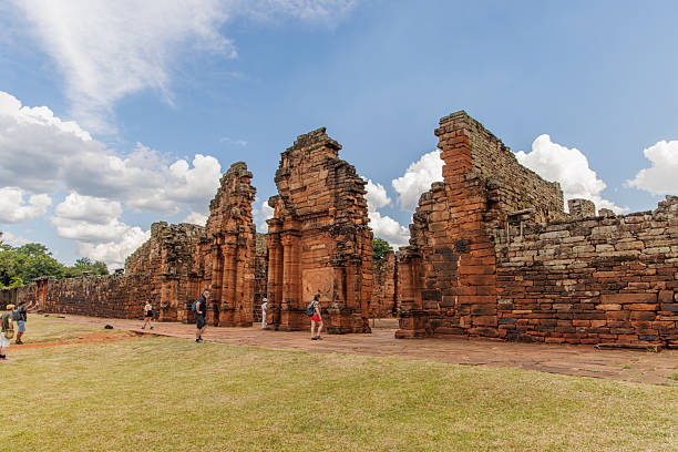 San Ignacio, Misiones, Argentina - May 5th, 2025: Tourists strolling through the ruins of San Ignacio.