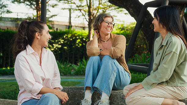 istock Diverse group people participating in outdoor community therapy session focused on mental health awareness and support sharing advice to promote empathy togetherness. Mental health concept. 2217337714