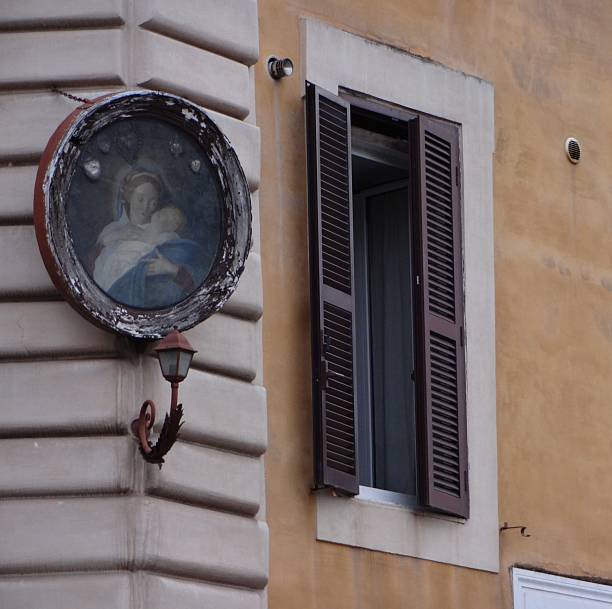 istock Icon on the old Italian building. 2217339452