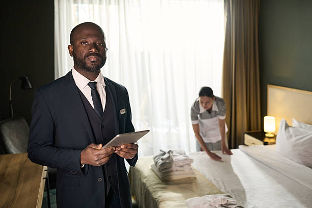 istock African American Hotel Manager Checking Rooms 2217340660