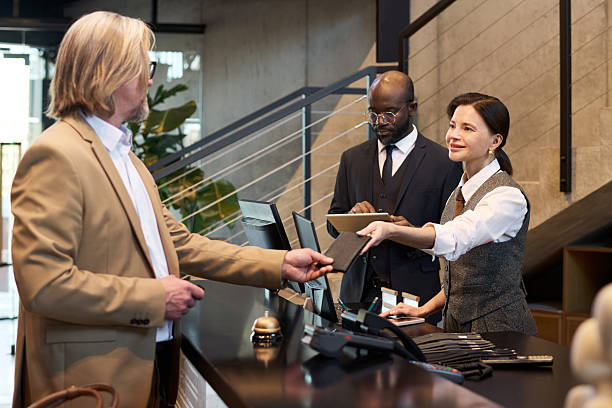 istock Conducting Business Meeting at Modern Office Reception 2217340718