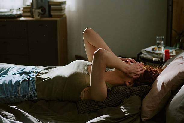 istock Relaxing Indoors on Sunny Afternoon with Crumpled Sheets 2217344205