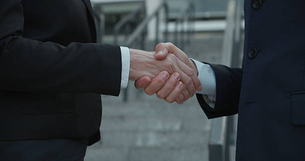 istock Close-up of business handshake, beginning of partnership, effective cooperation, teamwork 2217348163