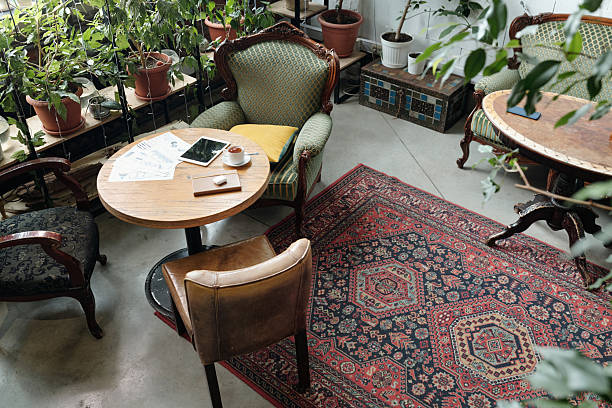 Cozy Cafe Corner with Plants and Rustic Furniture