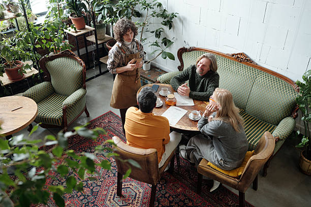 istock Engaging in Conversation at Cozy Indoor Gathering 2217348315