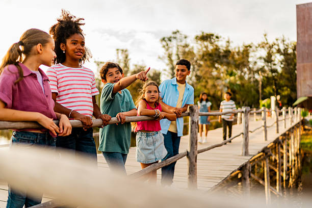 istock Kids talking on a zoo 2217349528
