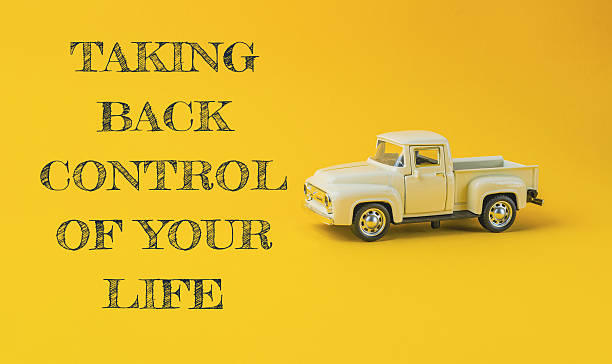 istock a yellow background with the words taking back control of your life 2217351877