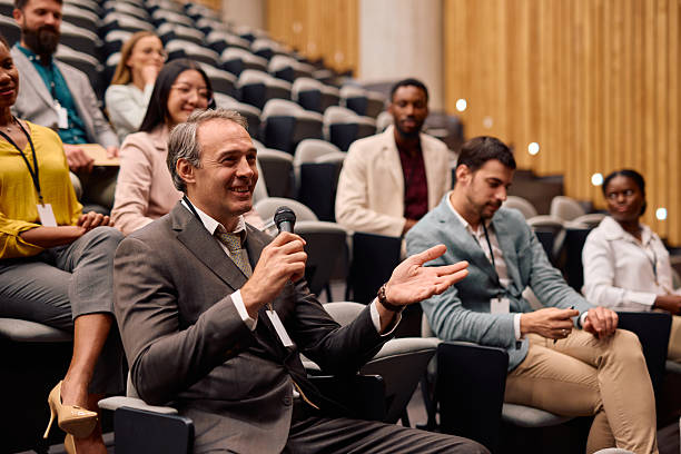 istock Mature businessman asking a question during a conference meeting 2217360151