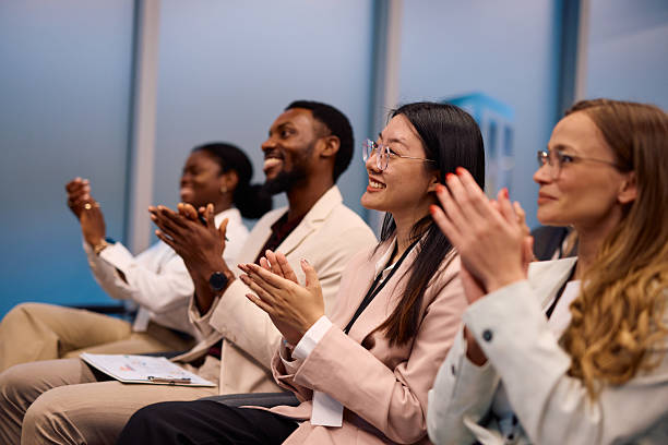 istock Diverse businesspeople clapping during a conference meeting 2217360189
