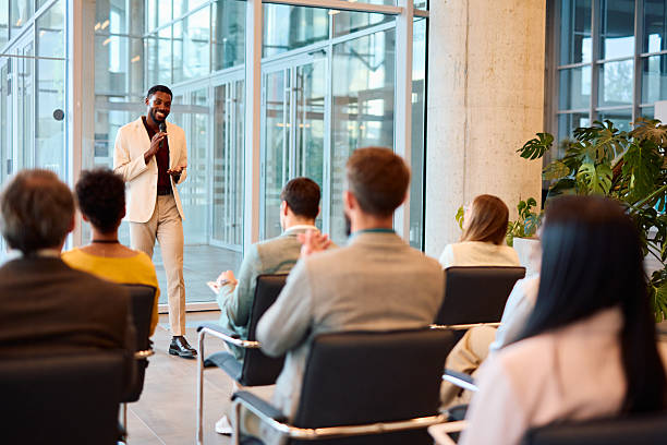 istock Motivational speaker inspiring audience during a business conference 2217360247