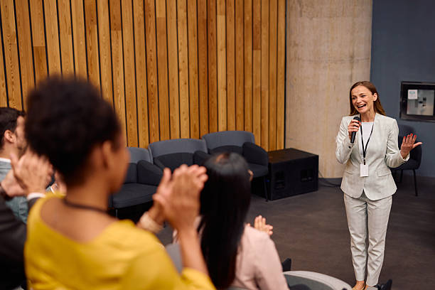 istock Motivational speaker inspiring audience during a business conference 2217360447