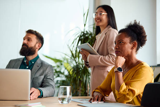istock Business team meeting brainstorming sharing ideas in the office 2217360607