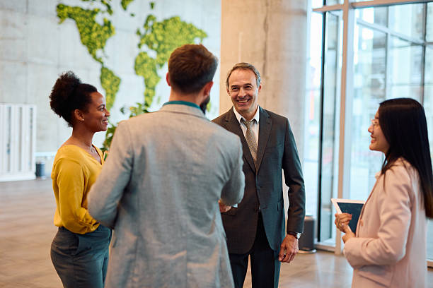 istock Business team discussing during informal meeting in modern office 2217360727