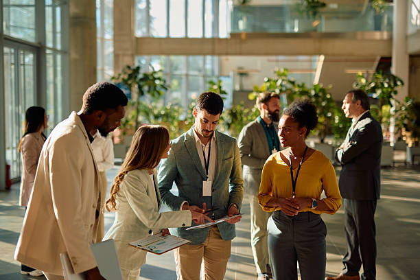 istock Business people discussing during a corporate event in a modern office building 2217361029