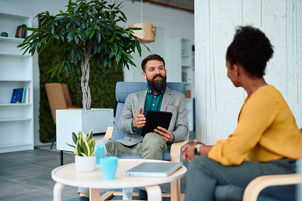 istock Business partners discussing during a meeting in modern office 2217361164