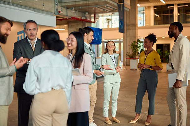 istock Business People Networking and Discussing During Coffee Break at Conference 2217361189
