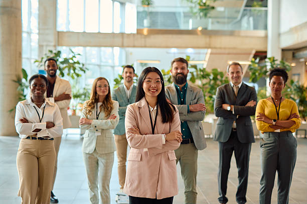 istock Diverse business team standing together in modern office lobby 2217361238
