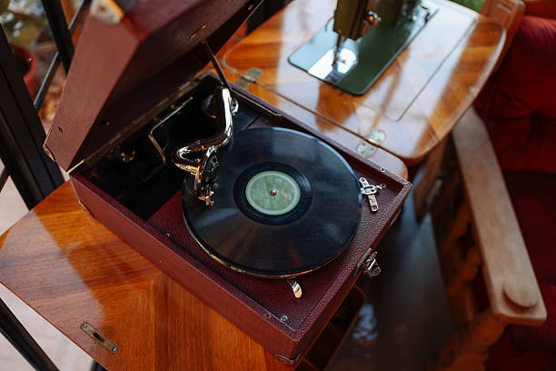 Close-up of a cartridge head on a vinyl record, analog retro music, vinyl disc collecting, vintage equipment