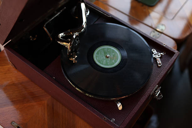 Close-up of a cartridge head on a vinyl record, analog retro music, vinyl disc collecting, vintage equipment