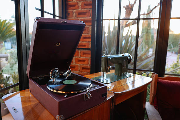 Close-up of a cartridge head on a vinyl record, analog retro music, vinyl disc collecting, vintage equipment