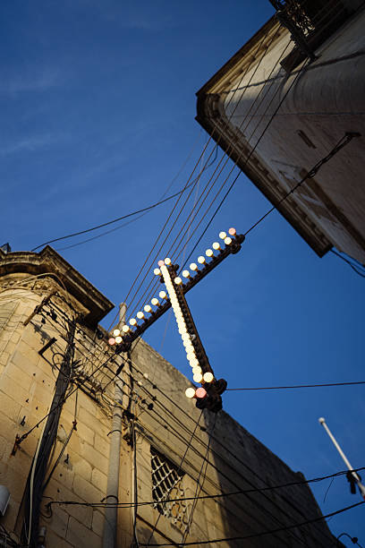 istock Christian Cross above a street on Easter 2217363437