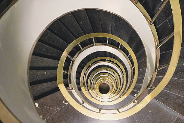 istock High angle view of a spiral staircase 2217364133