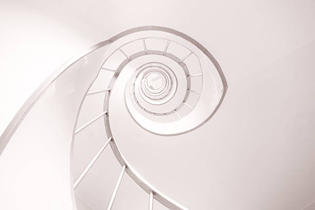 istock Low angle view of a spiral staircase 2217364148