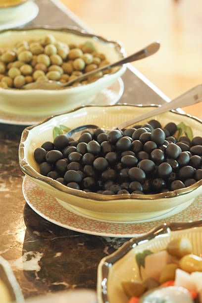 Olive selection on display at a Mediterranean restaurant buffet